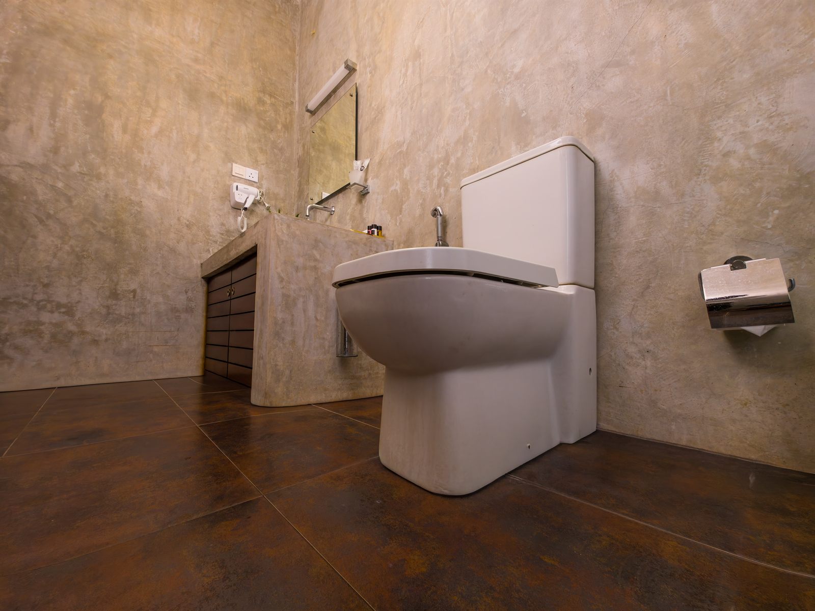 Superior Room bathroom low-angle toilet and vanity view