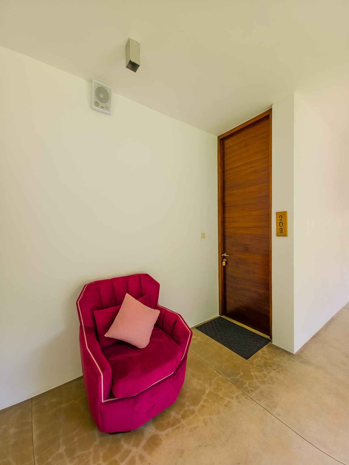 Superior Room entrance seating outside room 203